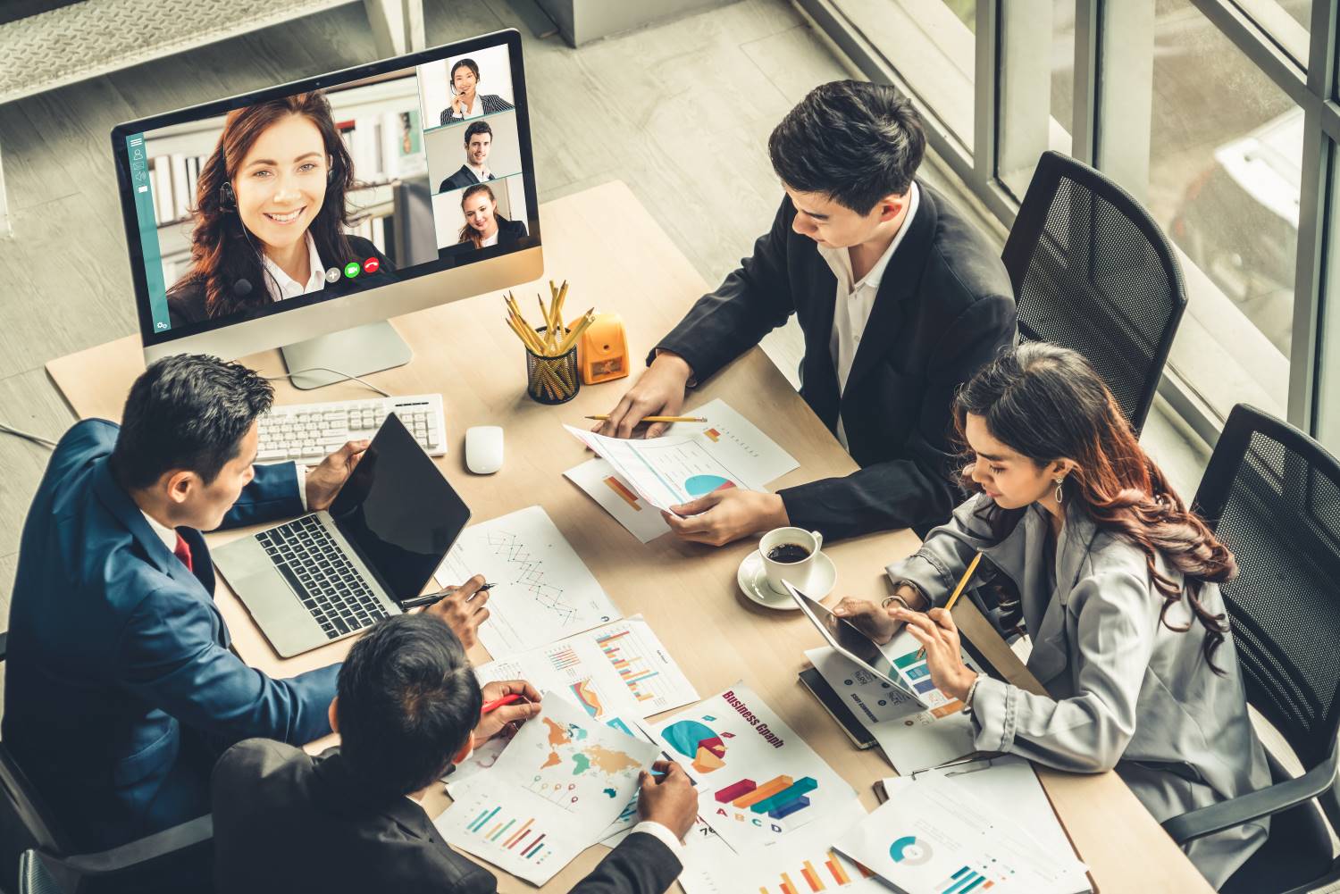 Virtual_Workspace_Meeting_Aerial Business people meeting on virtual workplace