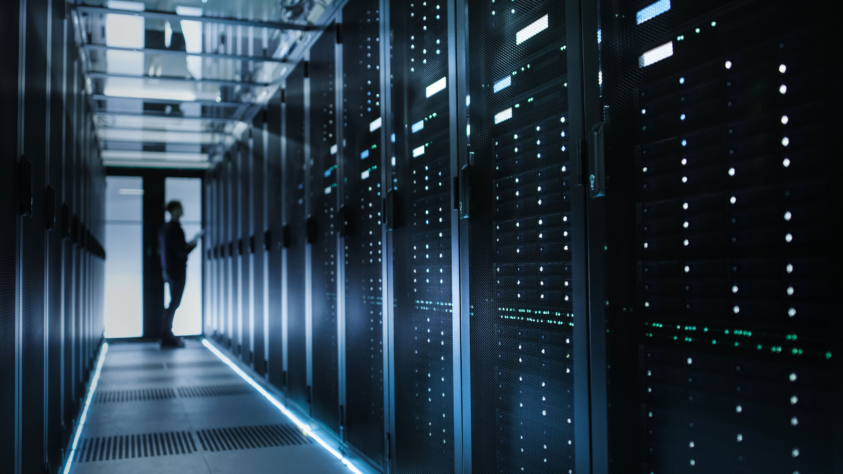 Out_of_Focus_IT_Technician_Turning_on_Data_Server