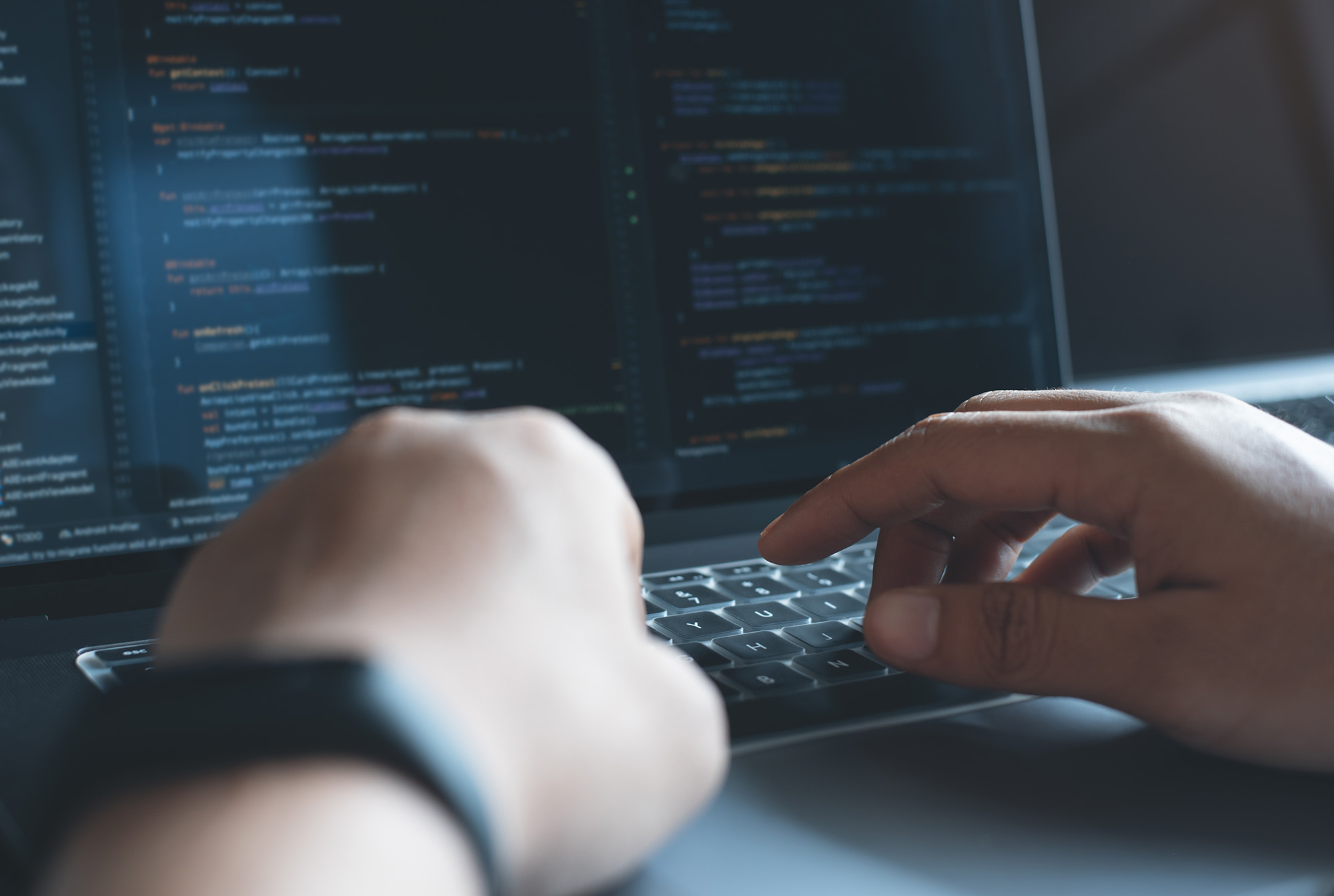 Web_Developer_Typing_on_Laptop