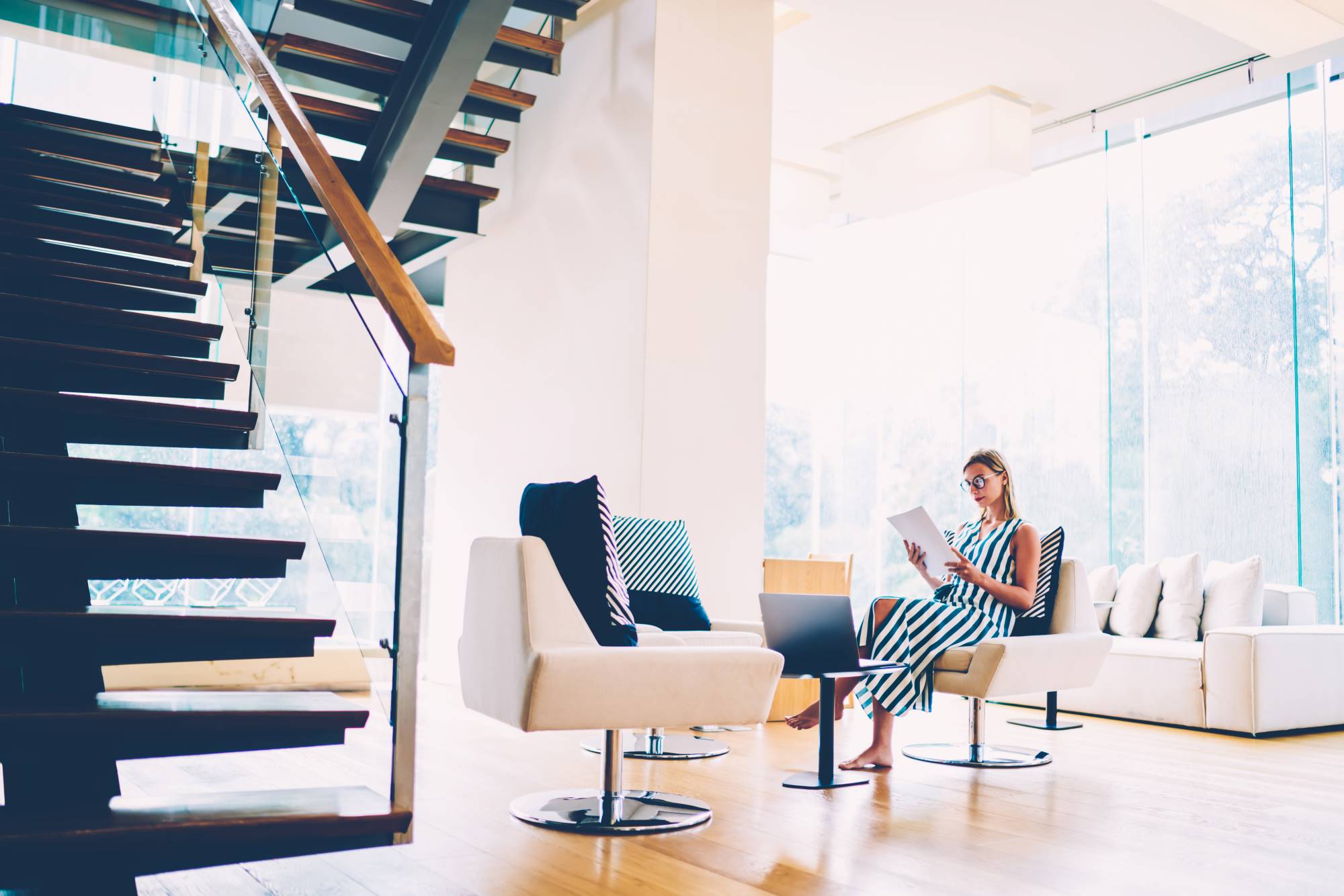 Fashionable woman working at home